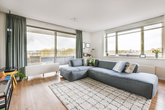 Spacious living room with served table