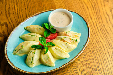 Dumplings di patate with basil and tomato sauce