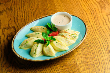 Dumplings di patate with basil and tomato sauce