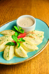 Dumplings di patate with basil and tomato sauce