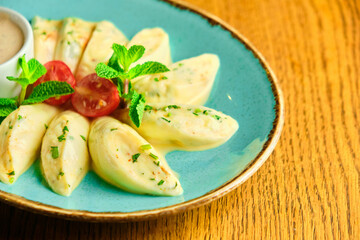 Dumplings di patate with basil and tomato sauce