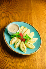 Dumplings di patate with basil and tomato sauce