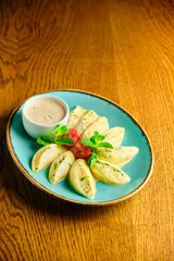 Dumplings di patate with basil and tomato sauce