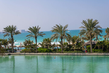 Fototapeta na wymiar Luxury beach resort with palm trees, Dubai, UAE