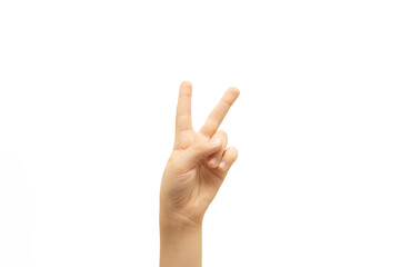 Child raising two fingers up. Peace sign gesture. White background.