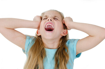Angry crazy scared teen girl covering ears screaming feeling annoyed, stubborn stressed outraged young girl. Isolated on white studio background