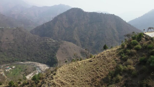 Aerial view of narrowed mountains road in scenic landscape india Himachal Pradesh Karol village