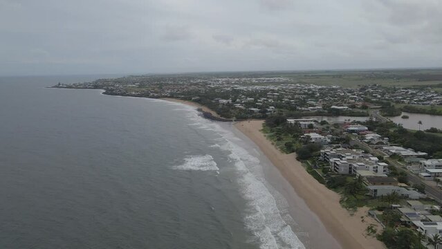 Aerial View Of Waves Rolling At The Beach Of Bargara In QLD, Australia.