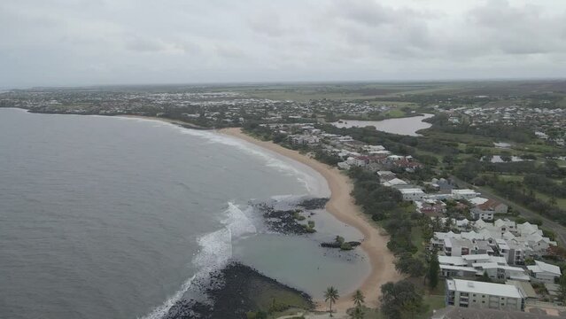 Swimming Basin At The Bargara Beach With Beachfront Hotels In Bundaberg, QLD, Australia. - aerial