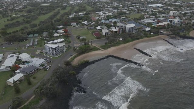 Bargara Coastal Town And Beach With Breakwater From Above - Bundaberg Region, Queensland, Australia. - aerial