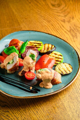 Fried pork rolls stuffed with prunes, wrapped in bacon,