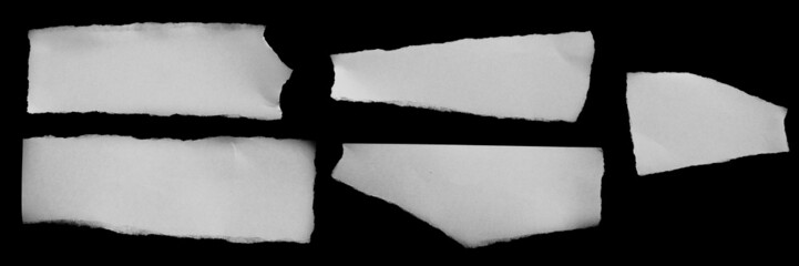 white torn paper on black background. collection paper rip.