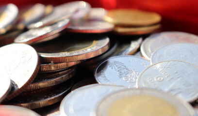 Close up of Thai baht coin concept appreciation baht or saving money (select focus).