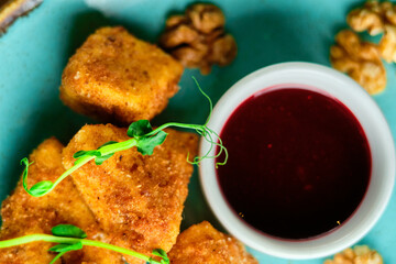 Breaded mozzarella cheese balls with