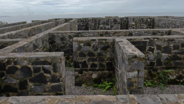 A labyrinth of cement walls with stone masonry as a result of the eruption of Mount Merapi