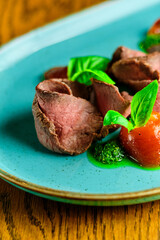 Meat flakes with basil