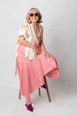 Portrait of a third age woman with free and youthful spirit