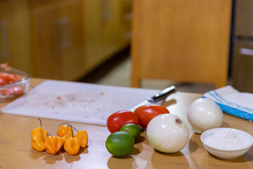 close up of man's hands cutting vegetables.