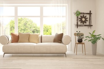 White living room with sofa and summer landscape in window. Scandinavian interior design. 3D illustration
