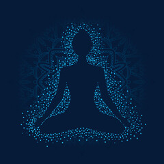 Girl in lotus position on blue background with mandala.