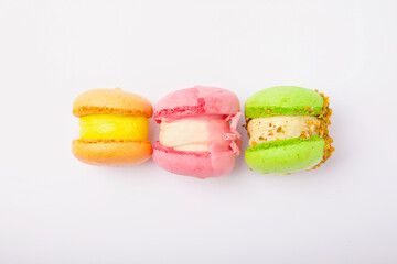Fresh bright colored macaroons or macaroons isolated on white background.Berry macaroons.Sweet macaroon dessert.