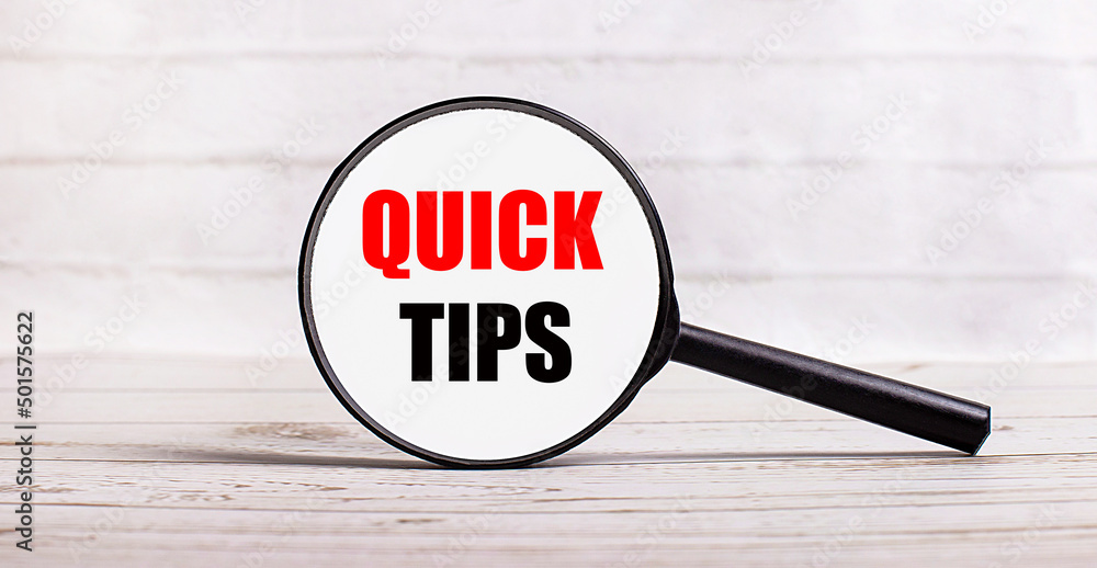 Poster the magnifying glass stands vertically on a light background with the text quick tips