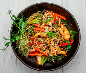 Asian dish, noodles with chicken and vegetables