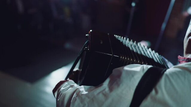Close-up of the accordion player playing