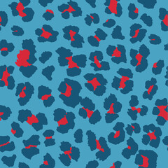 Seamless leopard pattern print in bright blue, navy blue and cherry red. 