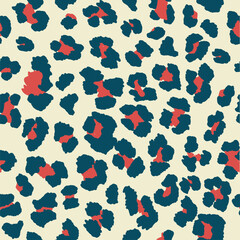 Seamless leopard pattern print in off-white cream, navy blue and berry red.
