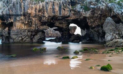 the Playa de Cuevas del Mar beach in northern Spain