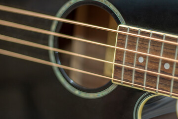 Acoustic bass guitar isolated on the white background