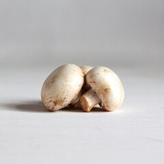 Champignon mushrooms on a white table
