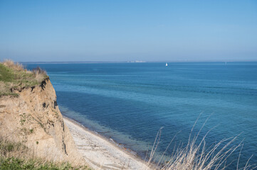 Fototapeta na wymiar Landscape of blue Baltic sea with white sand and sky in north Germany