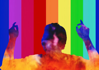 Silhouette shot: a man wearing headphones, frantically dancing to the music, filled with colorful ink, over a rainbow vertical bars pattern. Happy mood.
