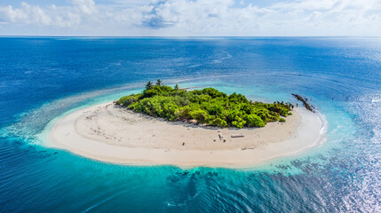 Aerial view to the small islands surrounded by cristal clear waters around Maldives