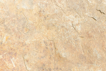 Closeup, natural stone wall as background, textures, concepts, copy space.
