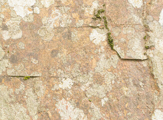 Closeup, natural stone wall as background, textures, concepts, copy space.