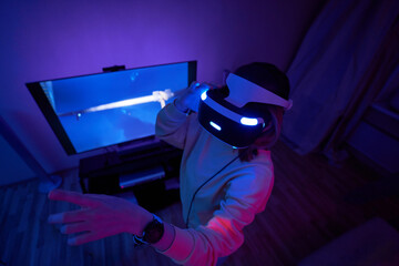 Woman interacts with virtual reality using a vr headset.