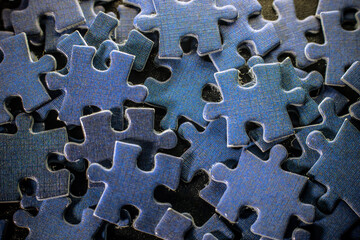 Jigsaw puzzle scattered on the table