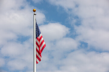 American flag hanging almost still