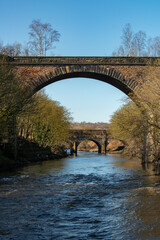 Fototapeta na wymiar Viaduct and aquaduct over river in Salford