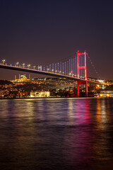 Fototapeta na wymiar Bosphorus bridge between Asia and Europe at night. Istanbul, Turkey.