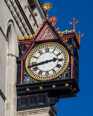 Fototapeta na wymiar Ornate Clock on the Royal Courts of Justice Building in London, UK