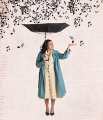 Contemporary art collage of beautiful woman in rain coat standing with umbrella under falling music notes isolated over grey background
