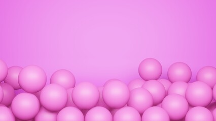 Pink spheres lie one on top of the other on a pink background. The place for the text is at the top.