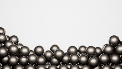 Metal balls lie one on one on a white background. The space for the text is at the top.