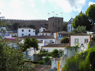 Obidos, Portugal.  View of the town, the medieval walls, and historic houses