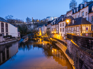 Fototapeta na wymiar Charming old town of Luxembourg on Alzette river illuminated at night