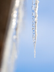 Large icicle against blue sky